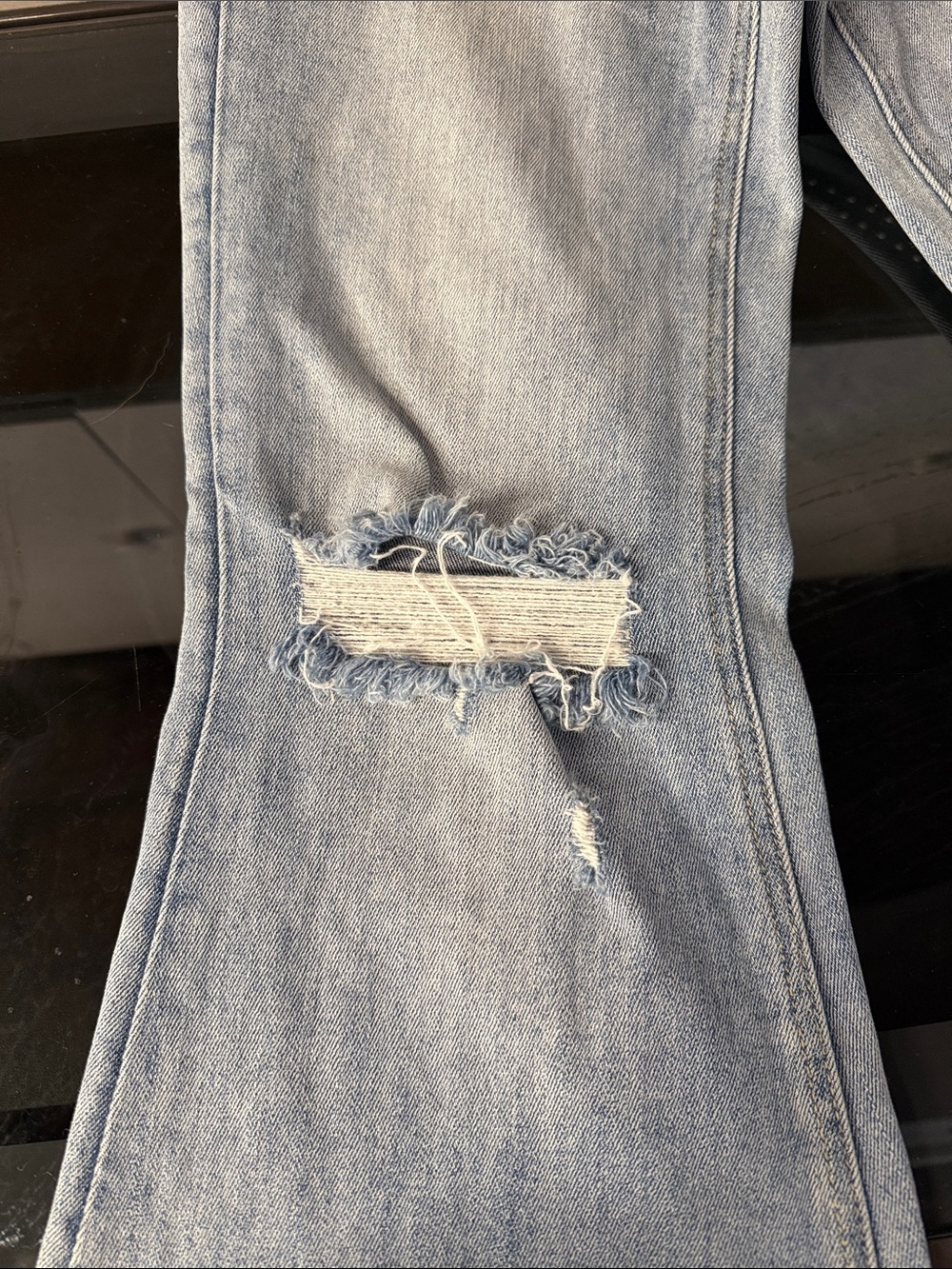 High-Rise Light Blue Distressed Flare Jeans - Picture 9 of 9